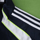 Corta-Vento Real Madrid 25/26 UBP - Azul com Branco Adidas