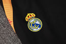 24/25 Conjunto Treino Real Madrid - Frio Zíper Curto - Branco com Laranja