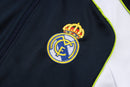 25/26 Conjunto Real Madrid 'Urban Purist' - Frio Zíper Longo - Preto