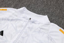 24/25 Conjunto Treino Real Madrid - Frio Zíper Curto - Branco com Laranja