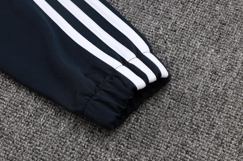 25/26 Conjunto Real Madrid 'Urban Purist' - Frio Zíper Longo - Preto