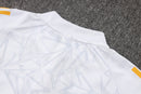 24/25 Conjunto Treino Real Madrid - Frio Zíper Curto - Branco com Laranja