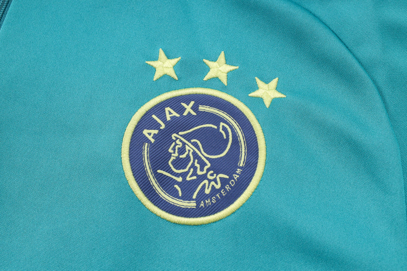 24/25 Conjunto Treino Ajax - Frio Zíper Curto - Azul Claro