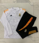 24/25 Conjunto Treino Real Madrid - Frio Zíper Curto - Branco com Laranja
