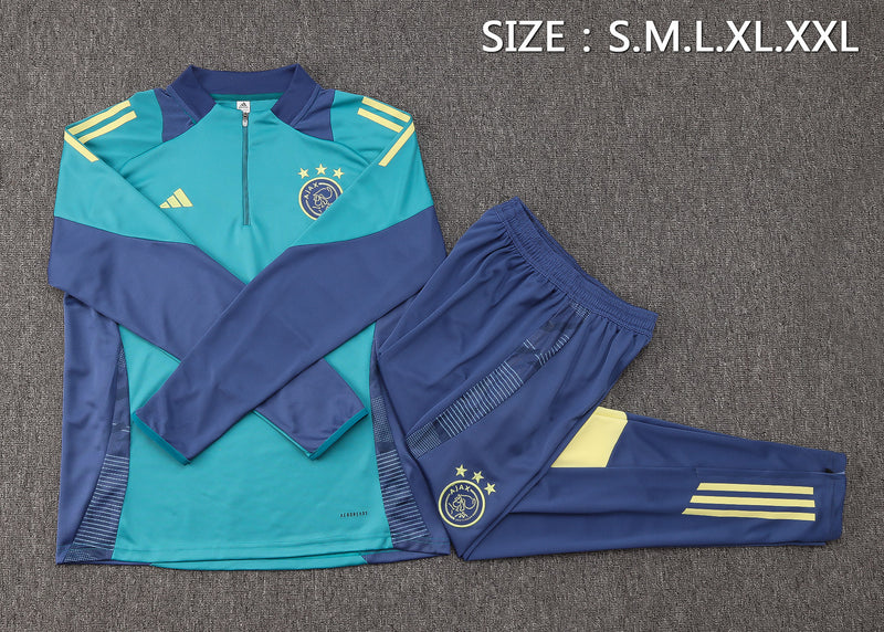 24/25 Conjunto Treino Ajax - Frio Zíper Curto - Azul Claro